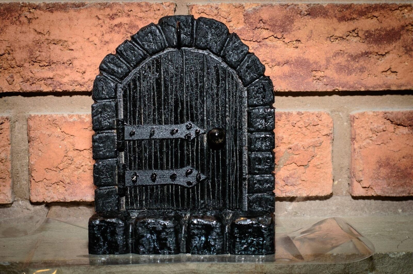 Faerie door and frame completely primed in black